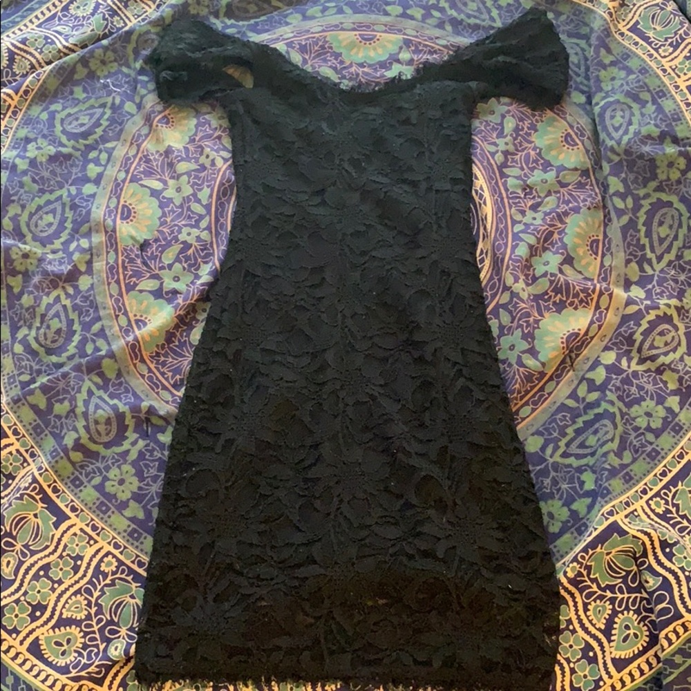 This is a beautiful black lacey dress